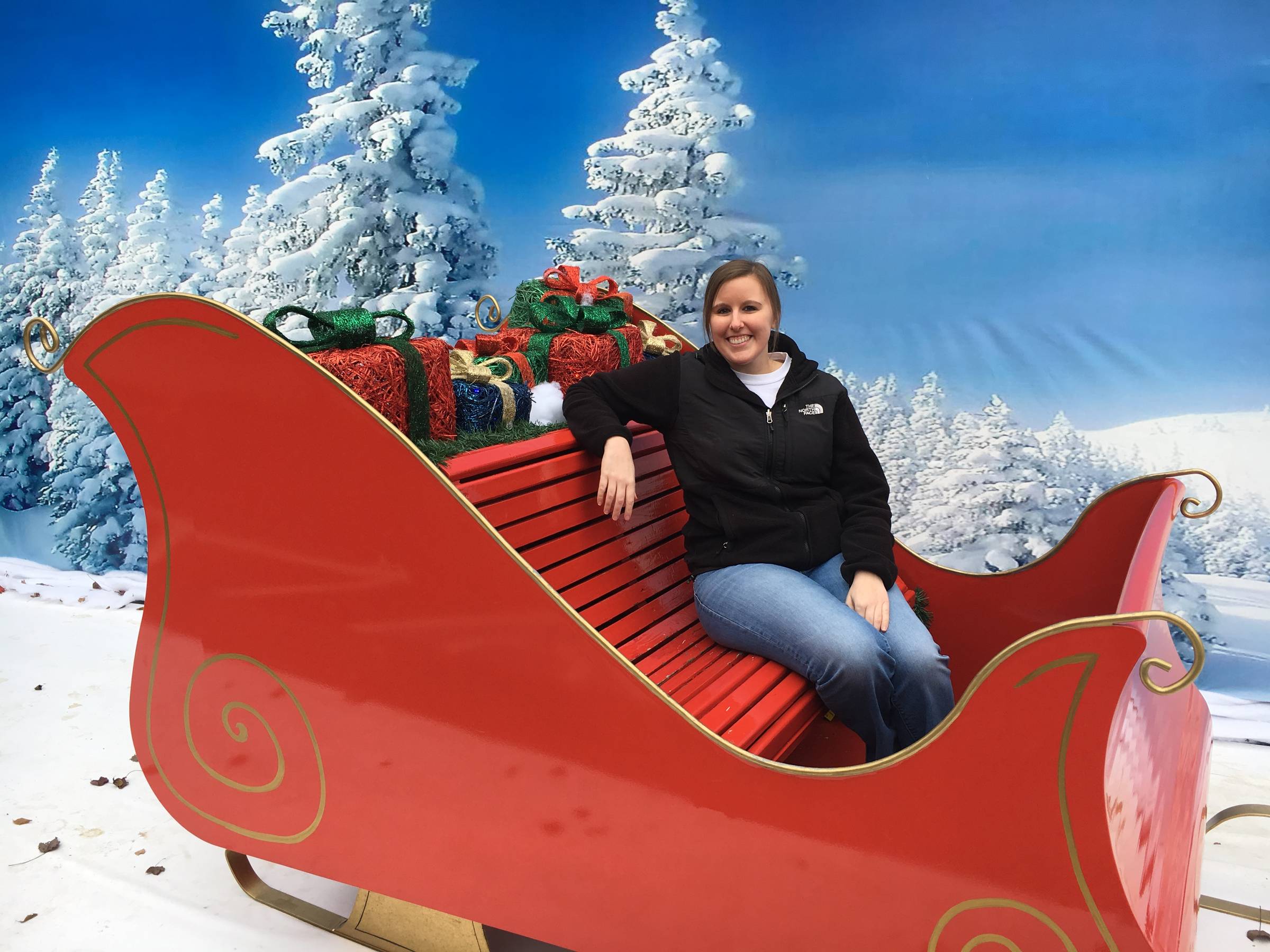 Katie Rockey in a Christmas sleigh