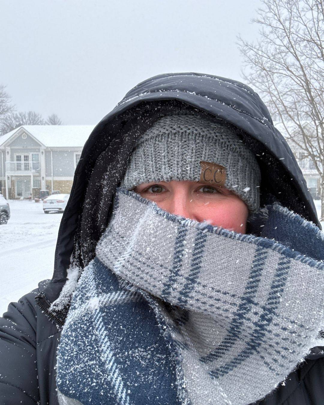 Katie Rockey outside in the winter with snow falling in Nashville, Tennessee